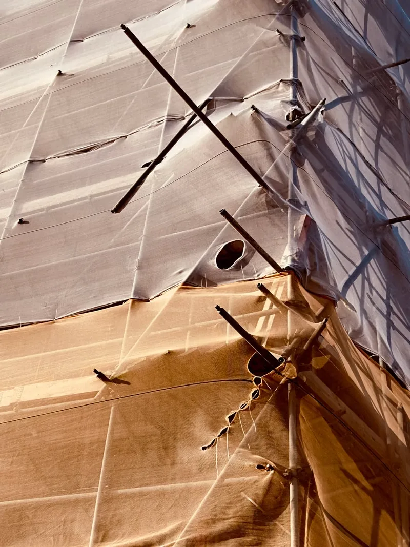 Industrial structure with protective cover installed